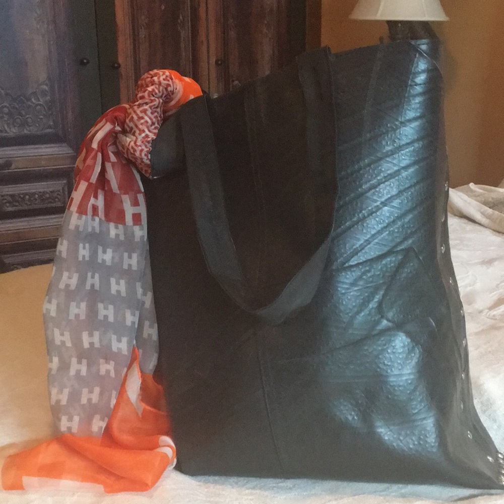 Recycled tire purse/tote.